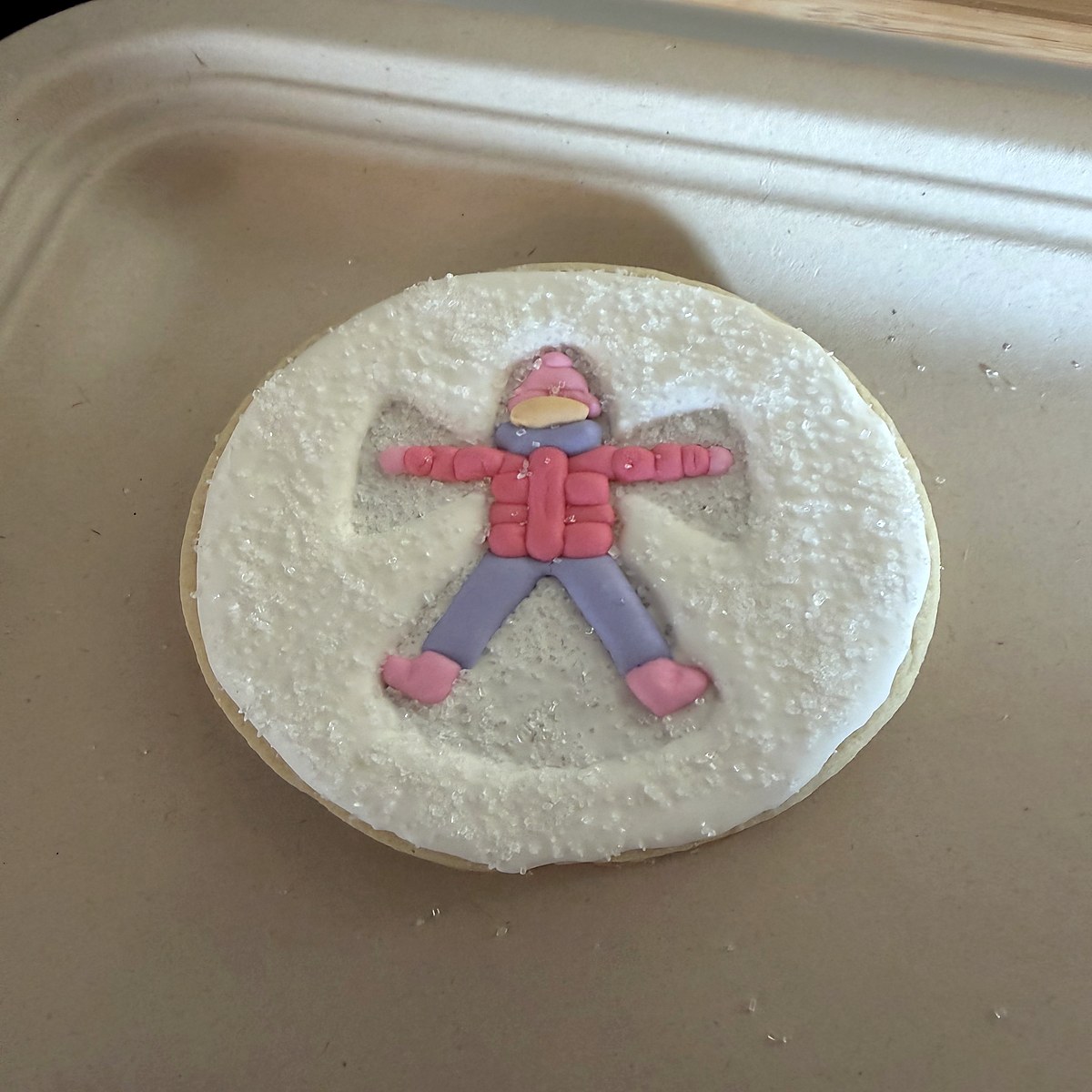 Snow angel decorated sugar cookie